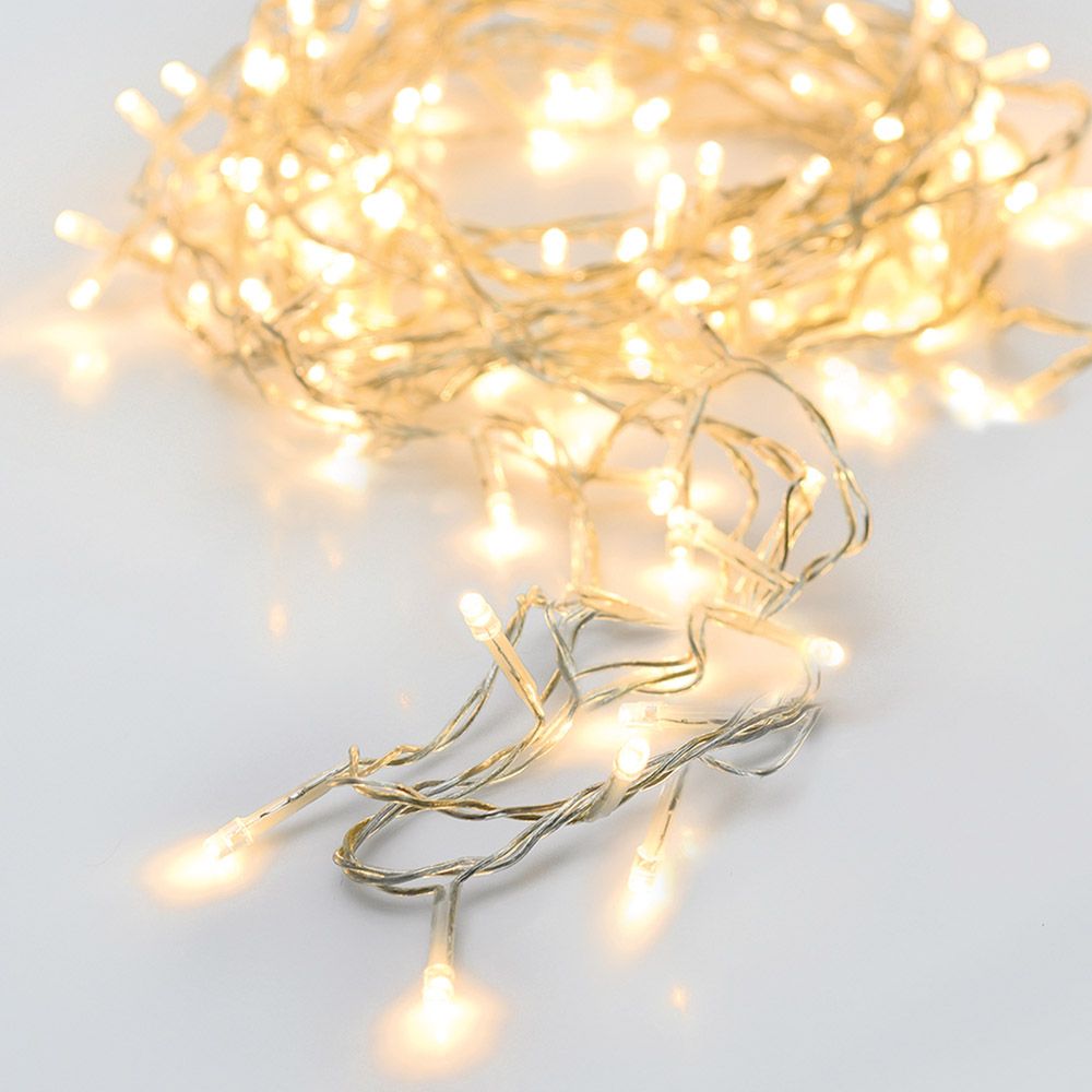 Grinalda a pilhas multifunções 48 leds branco quente cabo transparente IP44 4m